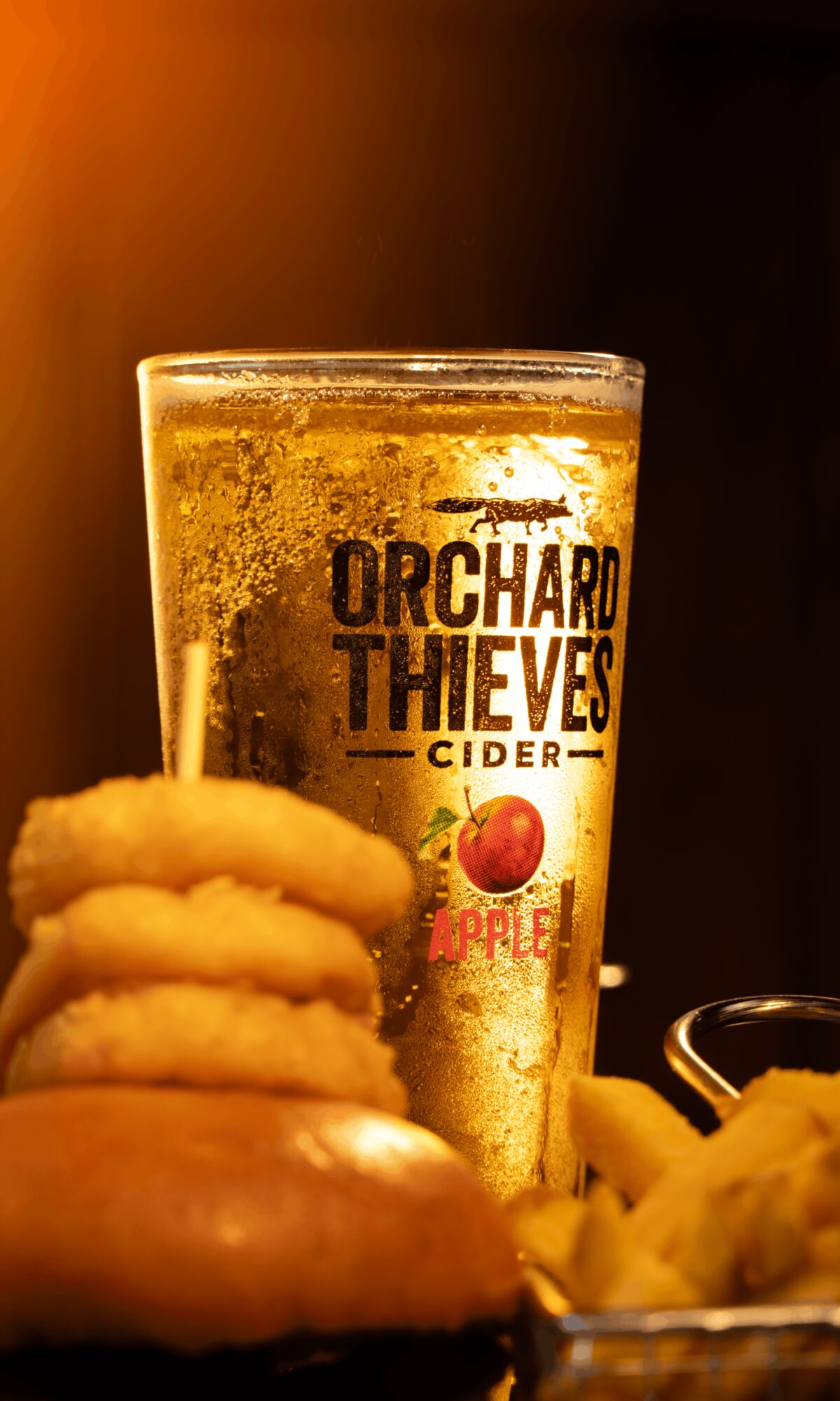 Orchard Thieves cider with onion rings